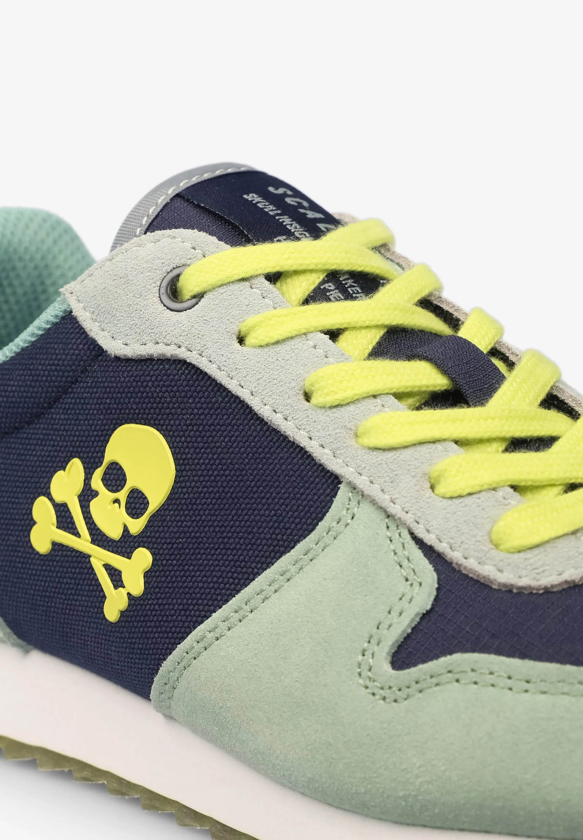 SNEAKERS WITH SKULL INSIGNIA